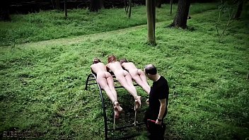Three submissive slaves in extreme BDSM