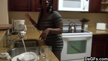 Hot fuck in the kitchen with a black ebony