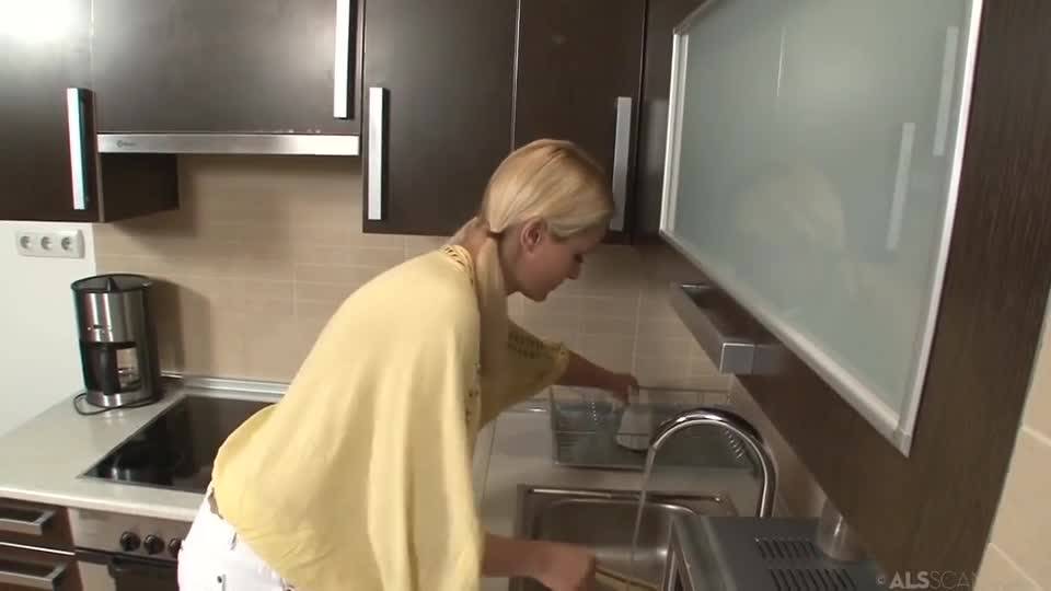 Sensual exploration of a blonde in the kitchen