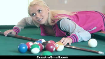 A naughty game of billiards: A blonde finds herself naked after a bet