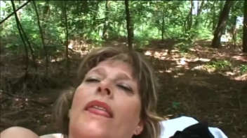 Mature woman Juditta has sex in the forest