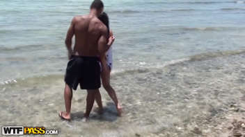 Hot beach: Lovers without embarrassment enjoy a naughty afternoon