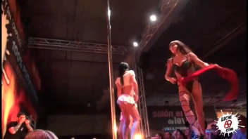 Captivating live erotic show: Talented actors deliver a steamy performance on stage.