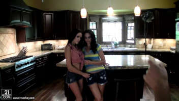 Two passionate lesbians in the kitchen
