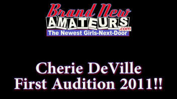 First appearance of Cherie Deville: A sultry blonde reveals herself in a solo casting