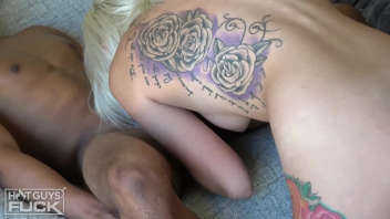 Blonde and Tattooed with a Virile Black