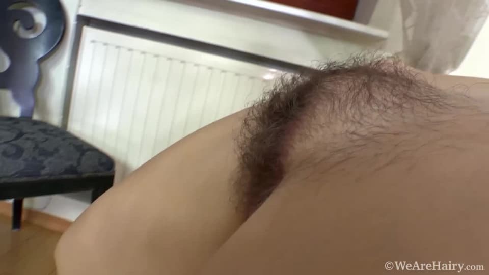 Beautiful hairy brunette: Discover a generously hairy vulva