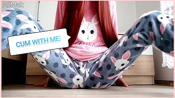 Asian teen caresses herself in pajamas