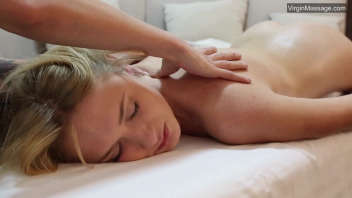 Innocent teenage girl explores pleasure during massage