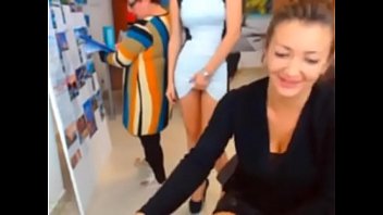 Two hot girls in the office have fun