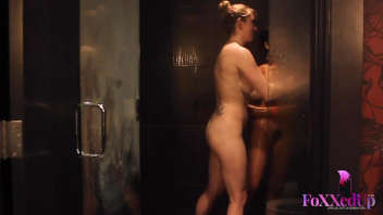 Hot shower between two women